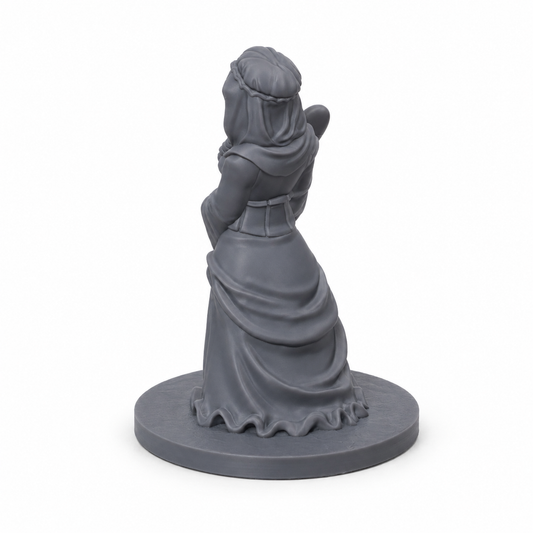 3D-printet bakerlærling med brød, kjole og flette i grå PLA til D&D og tabletop-rollespill.