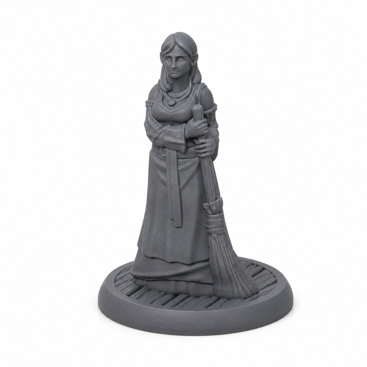 3D-printet tjenestekvinne med kost, lang kjole og rolig positur i grå PLA til D&D og tabletop-rollespill.